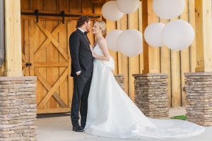Bride & Groom in front of event space